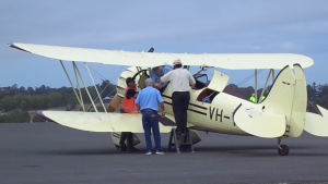 Elaine getting out after the flight. 
